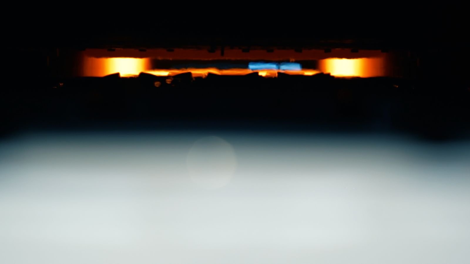 Ceramic ware glowing inside the kiln during firing